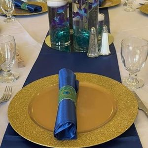 95 gold with glitter rimmed charger plates